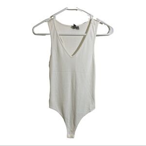 ASOS V-Neck ribbed bodysuit. White racerback size 2 stretches.